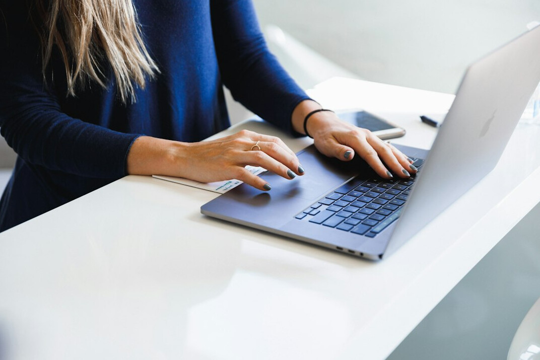 woman learning on laptop
